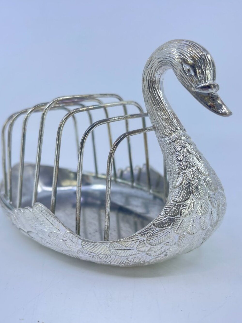 vintage silver plated swan toast rack with ornate detailing 6-slot design